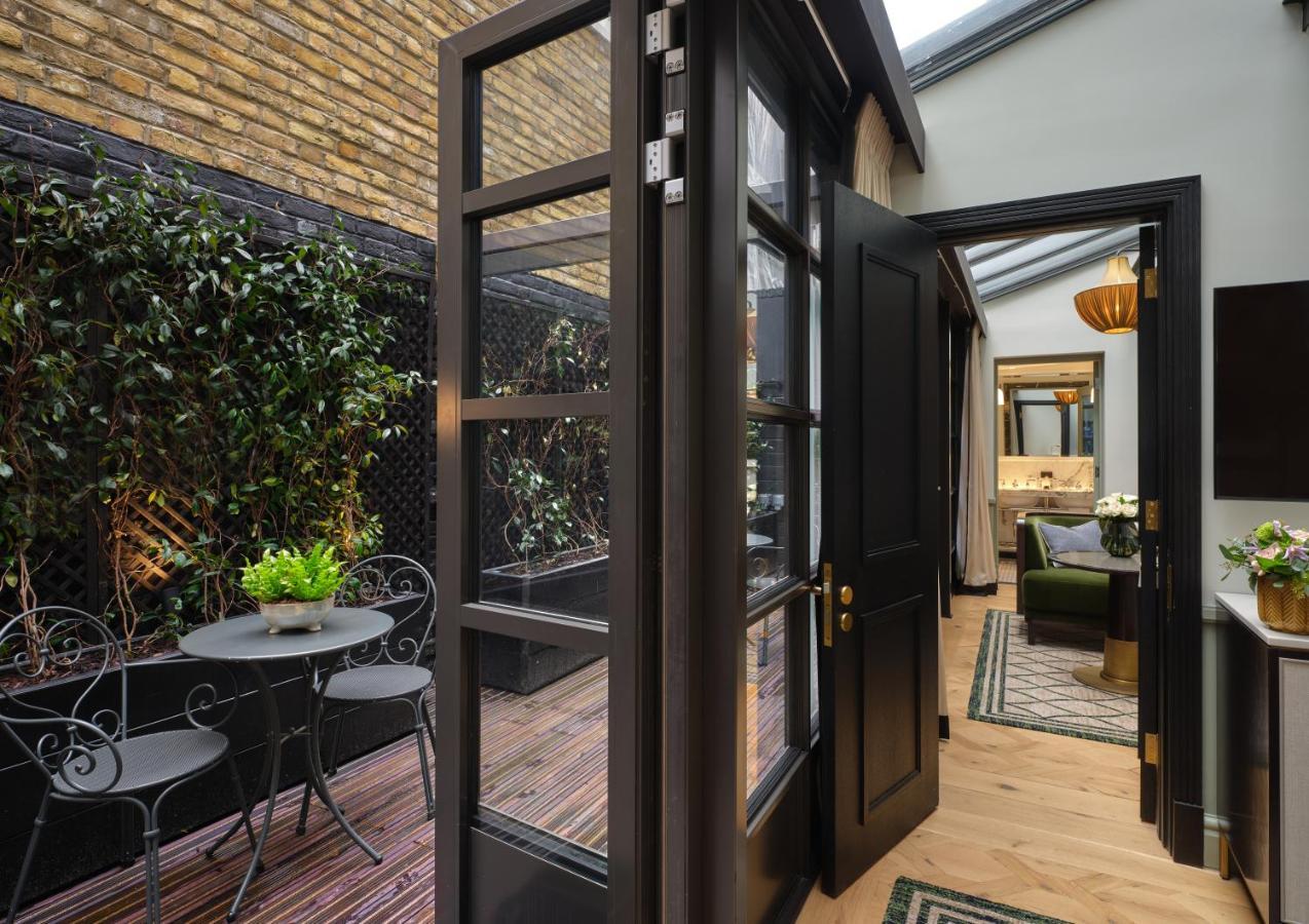 The Mayfair Townhouse - An Iconic Luxury Hotel London Eksteriør bilde The interior of a typical apartment at The Standard East Village